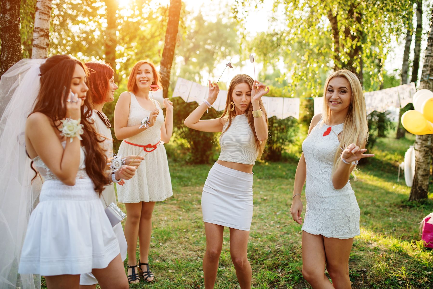 Group celebrating outdoors at a wedding-related event