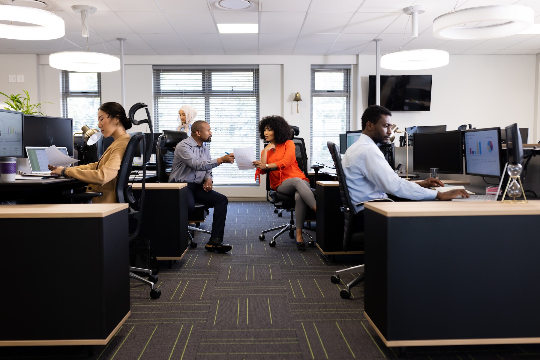 Colleagues collaborating in an office setting