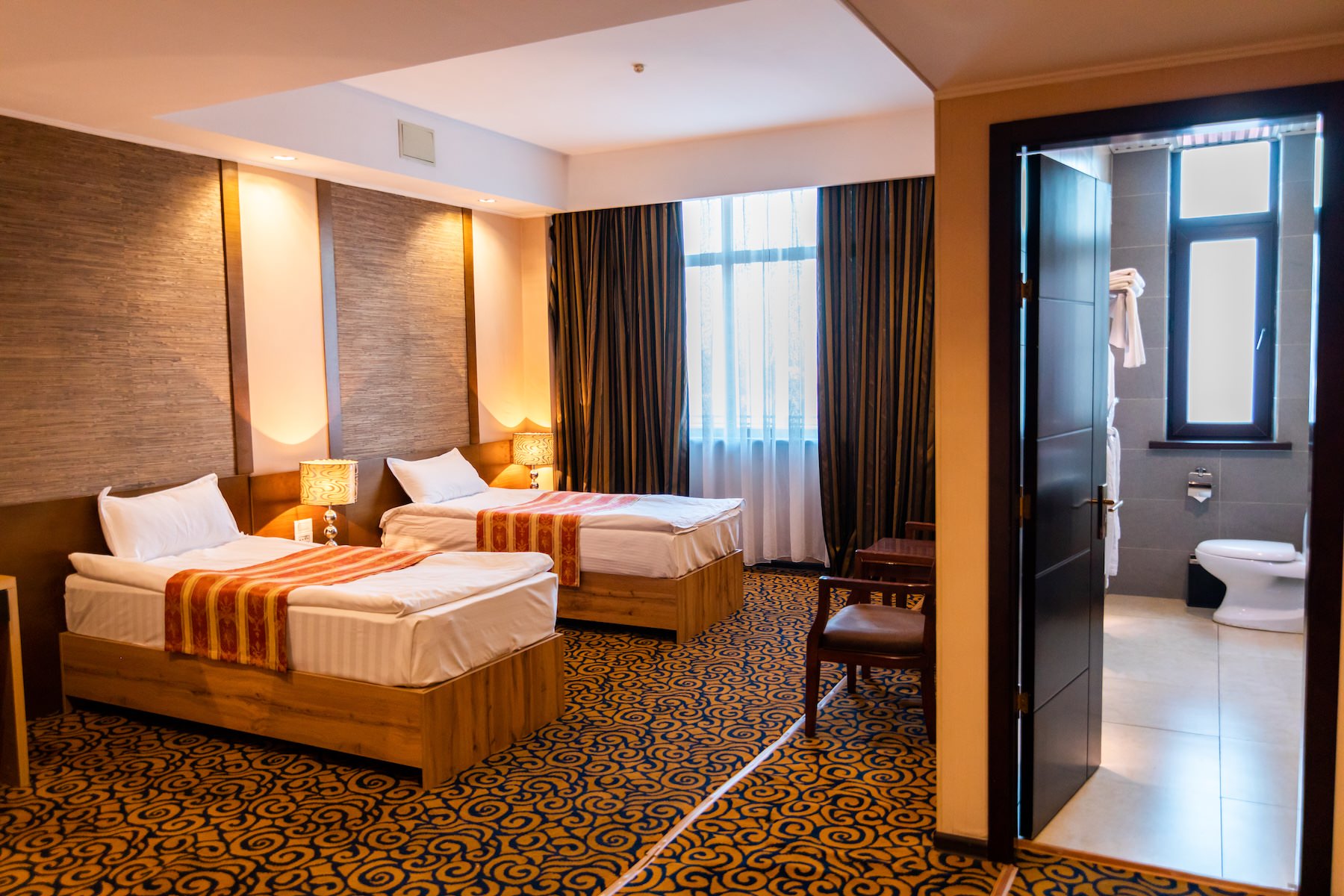 Hotel guest room with two beds